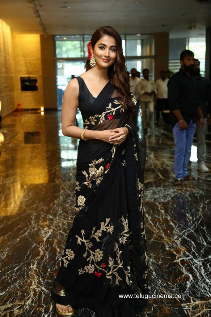 People's Desire 💘 | Black sarees are always a show-stopper, and now we can  see that pooja hegde knows just how to increase her style quotient by  utilising th... | Instagram