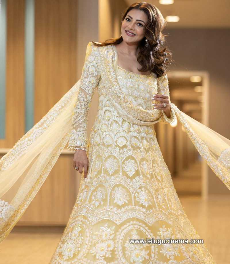 Kajal Aggarwal slays maternity fashion in halter-neck yellow chiffon  patterned maxi dress worth Rs.10,000 : Bollywood News - Bollywood Hungama