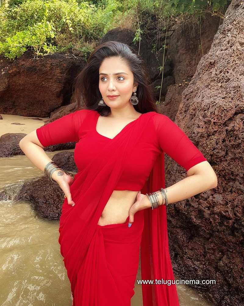 Sreemukhi in a Red Saree at a Goa beach | Telugu Cinema