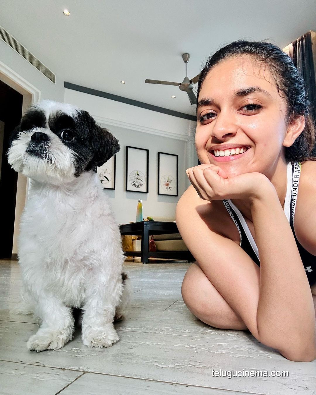 Keerthy Suresh playing with her pet dog
