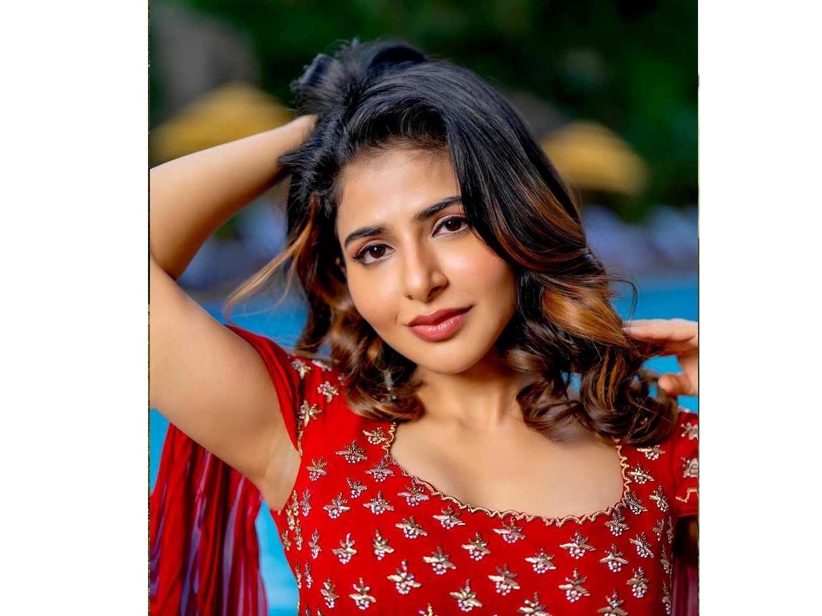 Iswarya Menon in a red long gown | Telugu Cinema