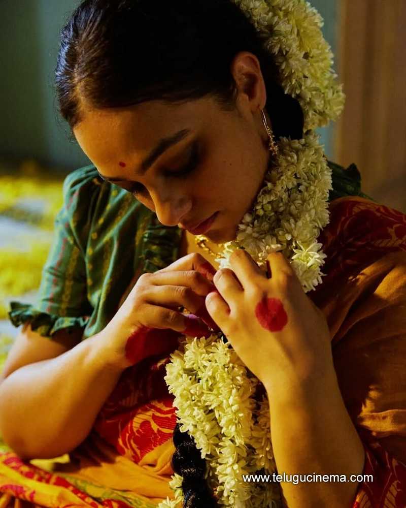 nithya still 03022502