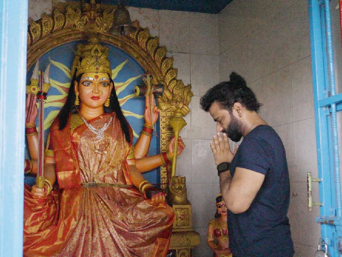 Devi Sri Prasad traces the roots of Yellamma to his native village 1 Devi Sri Prasad praying at Vedurupaka temple