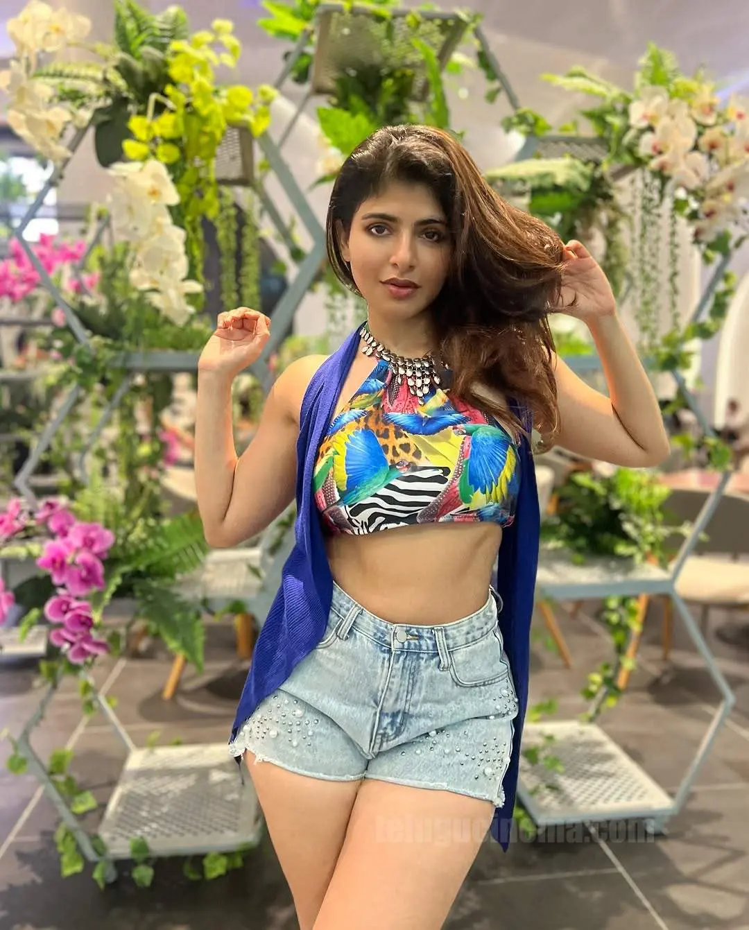 Iswarya Menon in a denim short